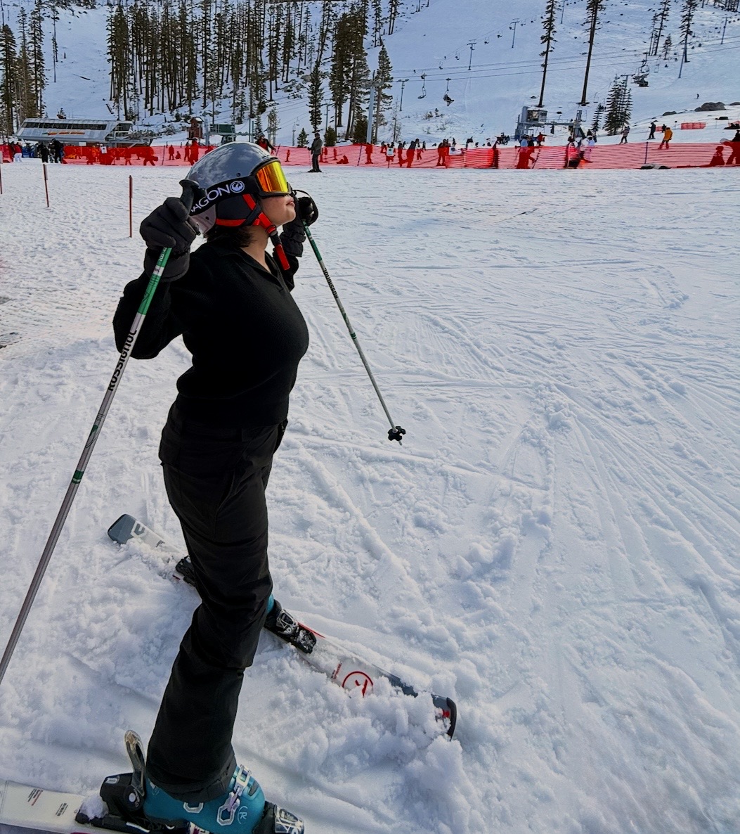 Puja skiing on a snowy mountain